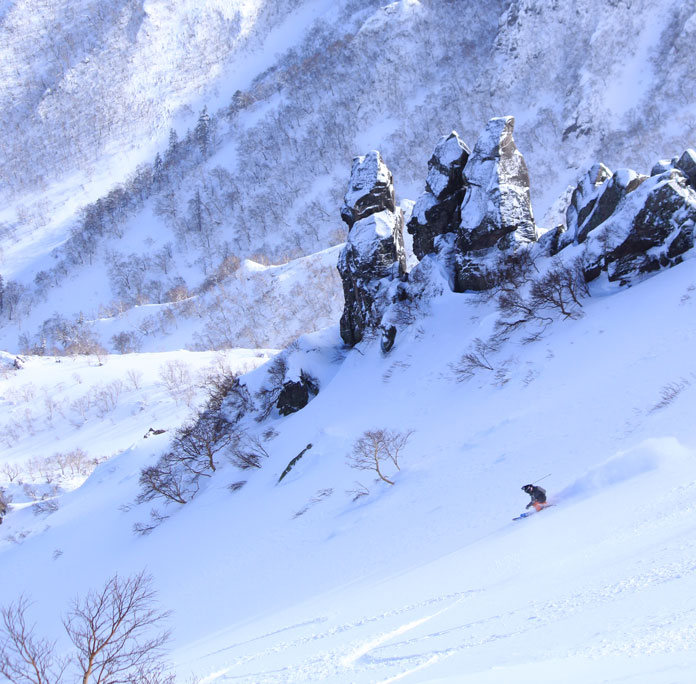 Backcountry skiing above Kurodake
