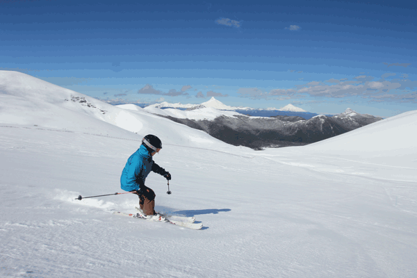 Skiing Antillanca with view to Puntiagudo & Osorno Volcanoes in the background © Owain Price