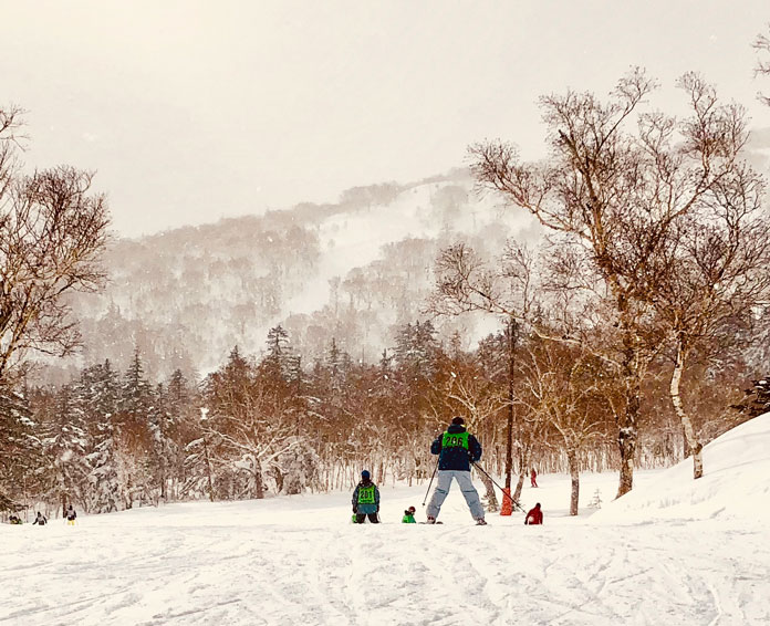 Local school group skiing at Kokusai