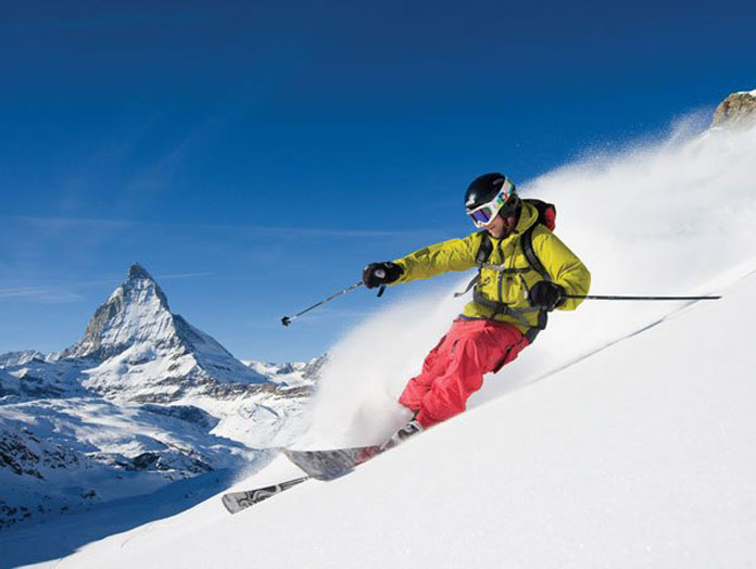 Skiing powder Zermatt