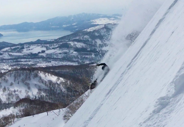 Peter Wunder hitting a super steep Hokkaido backcountry line on his Gentemstick Super Fish board