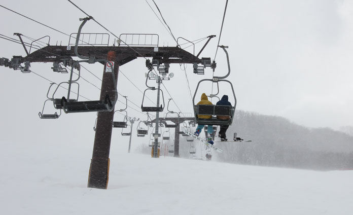 Riding the middle double chairlift at Okutone Snow Park