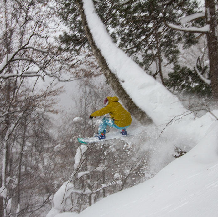 Hikaru Taira hits a big tree feature at Okutone Snow Park
