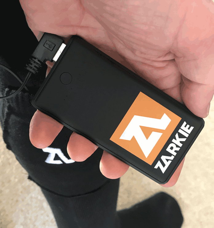 the slimline Zarkie battery showing its size against a hand