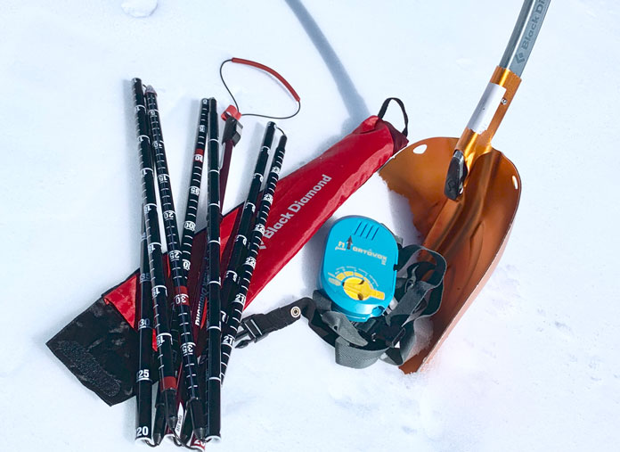 First on the list for ultimate ski day pack contents are your avi gear essentials: shovel, probe and beeper 
