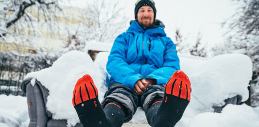 Lenz heated socks keep you warm even sitting in the snow!