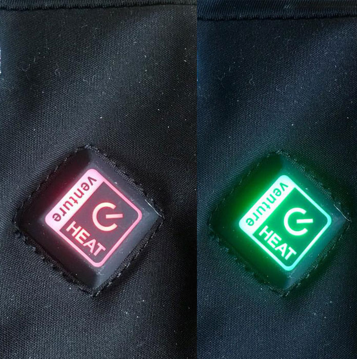 Heat setting button on Venture Heat Avert glove liners glows red or green according to the setting