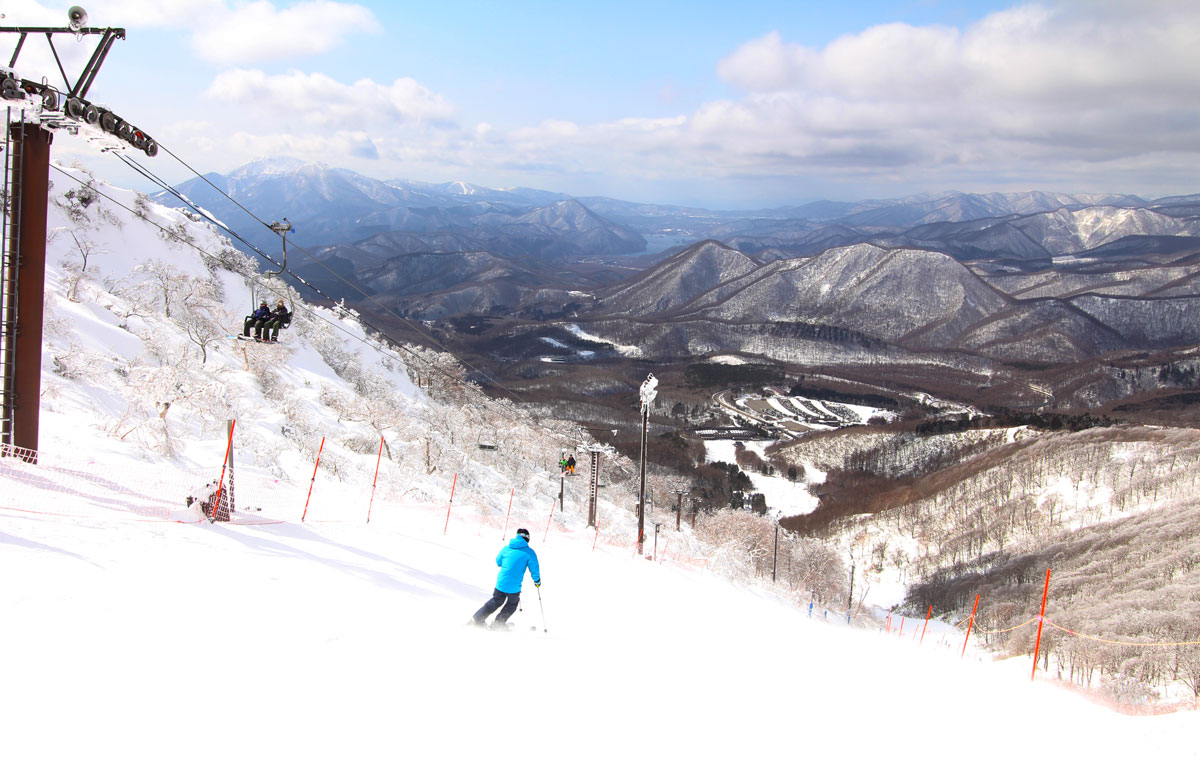 skiing Minowa ski area with a view to Mt Bandai