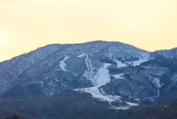Sunset view looking up at Iox-Arosa ski area, Nanto City, Toyama Prefecture