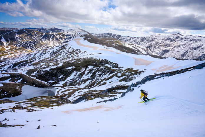 Skiing Club Lake chutes on the Main Range in December