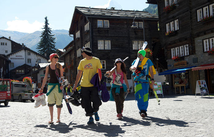 Summer skiers and snowboarders in Zermatt village