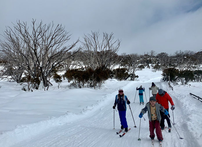 Family go for a cross country ski at Perisher