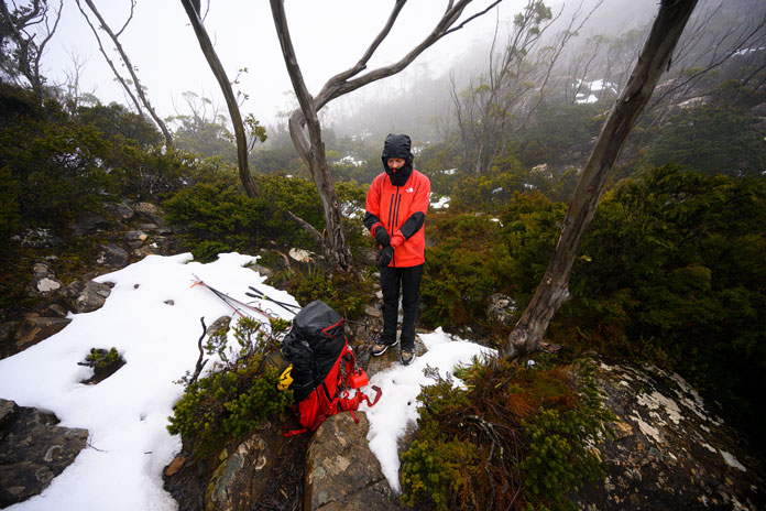Hiking through rainforest to ski the Du Cane Range in Tasmania