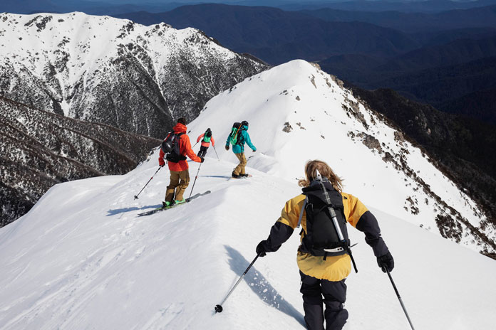 Group skiing Sentinel Ridge during filming of The Western Faces movie
