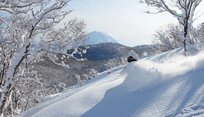 HPG ski guide with view to Mt Yotei on The PEak return to Hanazono, Niseko