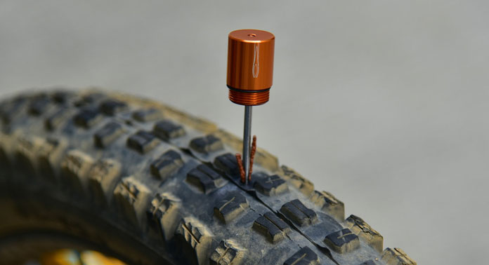 Using the Stash Tire Plug tool to fix a puncture