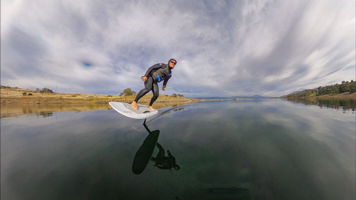 E-foil surfing calm water on Lake Jindabyne