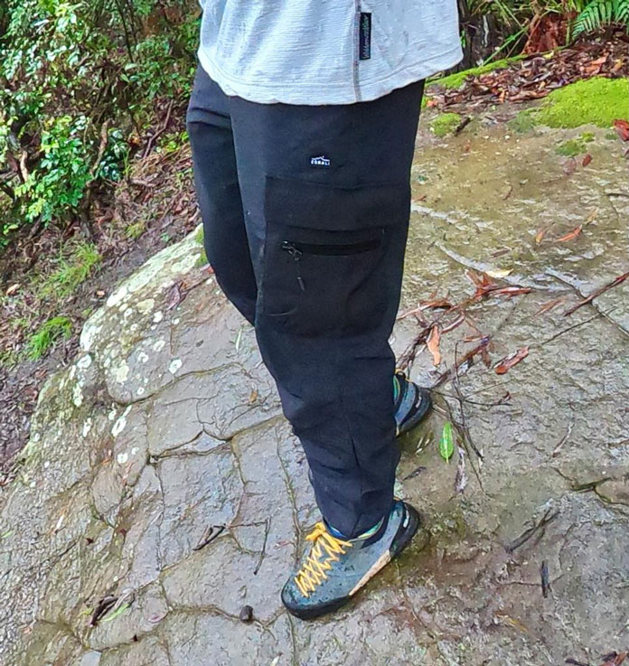 Close up of Zorali Venture Pant hiking in the rain