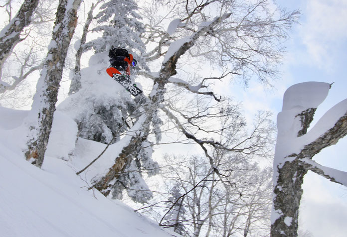 Riding deep powder at Kiroro