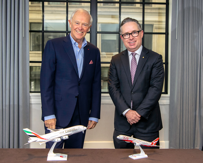 Sir Tim Clark and Alan Joyce sign the Qantas Emirates Partnership Extension agreement in Boston
