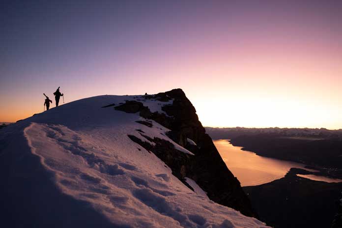 Hiking the ridgeline at The Remarkables to ski Lake Alta at night