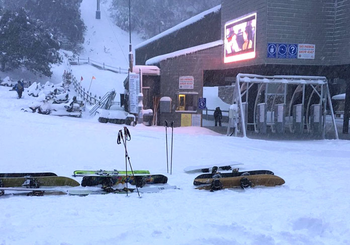 Lineup of ski and boards for first lifts at Thredbo