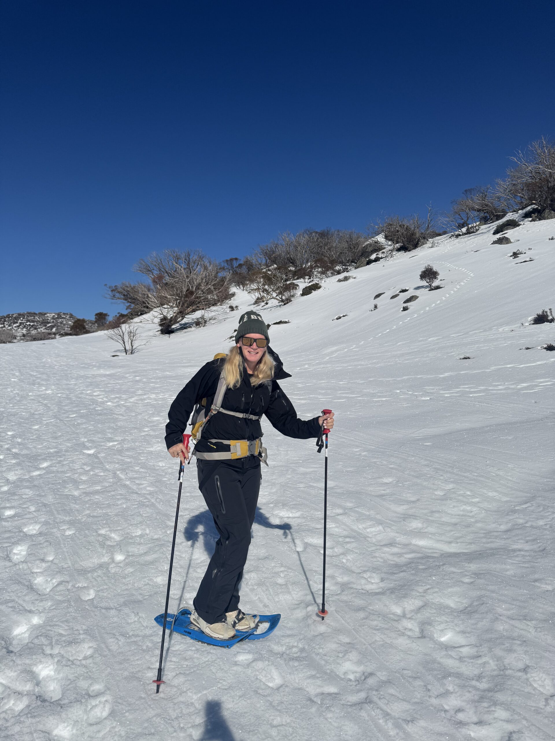 Emma Wilson on the skis at Perisher with the AARN Natural Exhilaration Backpack